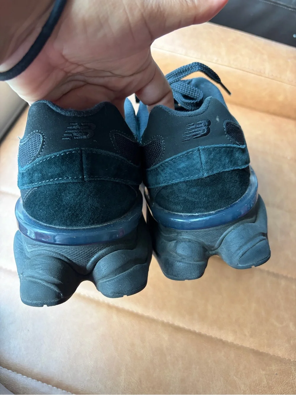 New Balance 9060 sneakers in a Triple Black colorway